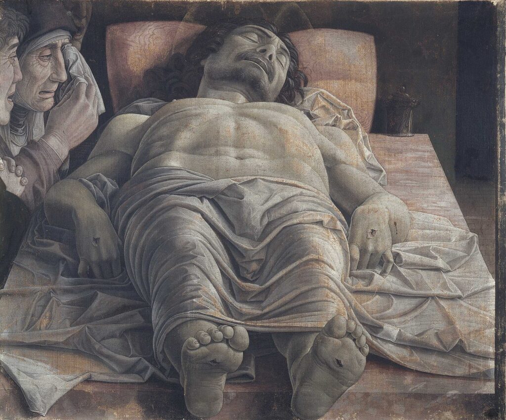 Andrea Mantegna’nın The Lamentation over the Dead Christ (Ölü İsa’ya Ağıt, 1480 civarı) eseri, radikal perspektif ve sert natüralizmiyle izleyiciyi kutsal acının fiziksel yakınlığına çeker.
Kaynak: https://commons.wikimedia.org/wiki/