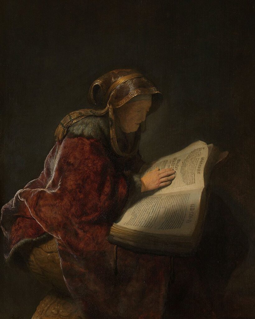 Rembrandt’ın “Yaşlı Kadın Okurken” tablosu, ışığın rehberliğinde bir ömrün bilgelik, sabır ve imanla nasıl bütünleştiğini resmeder. Figür, dünyevi olandan sıyrılmış bir ruhsal odak noktasıdır.
Kaynak: https://tr.wikipedia.org